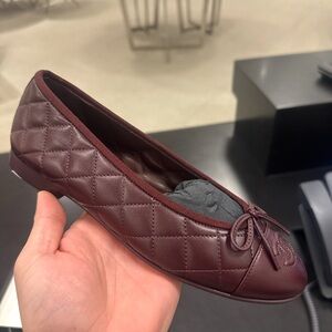 CHANEL Quilted Burgundy Ballet Flats